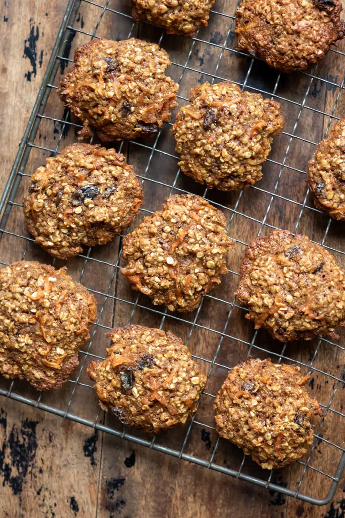 Carrot cookies cooling on a wire rack.