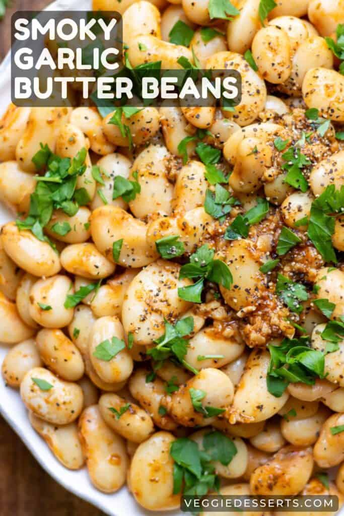 Plate of bean, with text: Smoky Garlic Butter Beans.