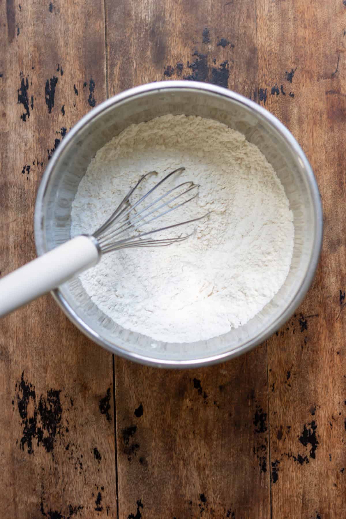Whisked dry ingredients in a mixing bowl.