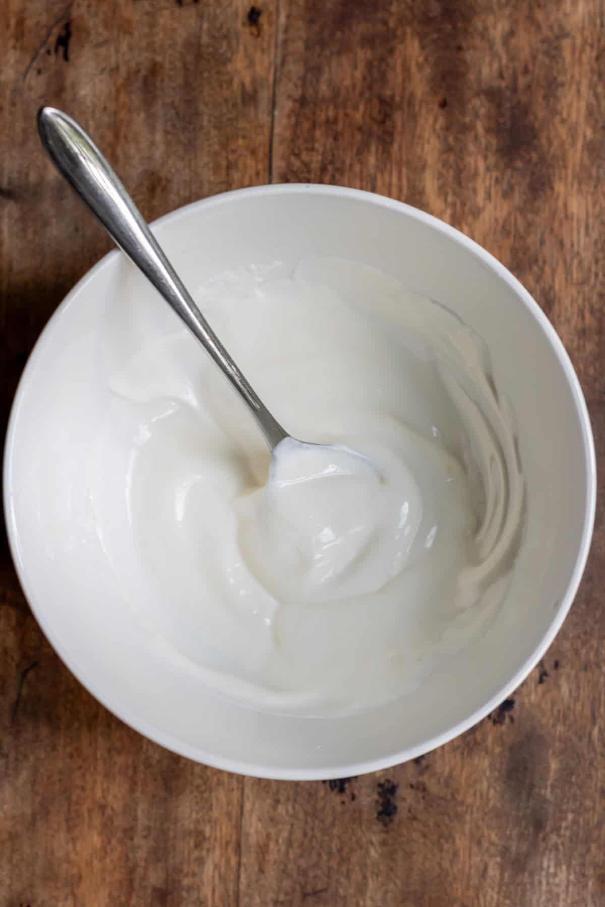 Icing sugar stirred into sour cream.