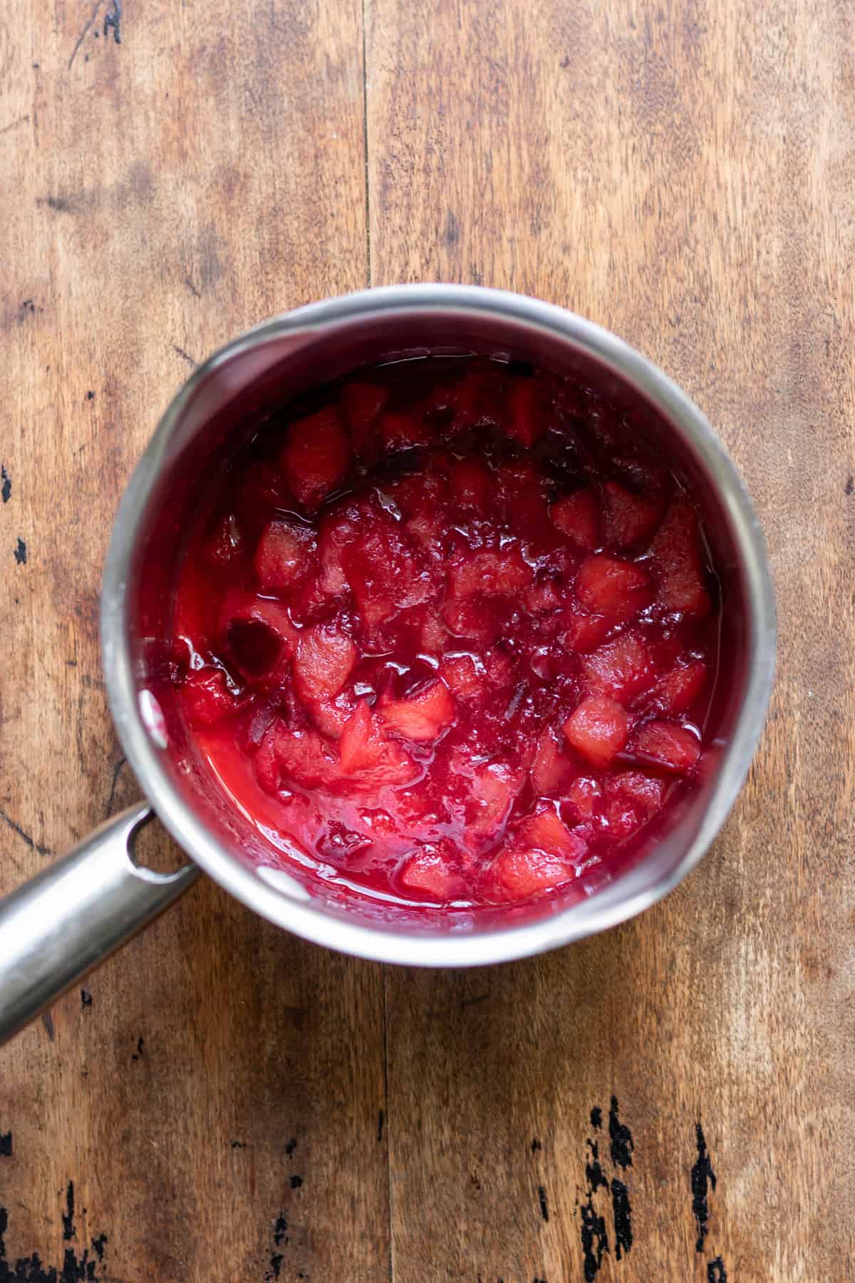 Cooked vanilla plum sauce.
