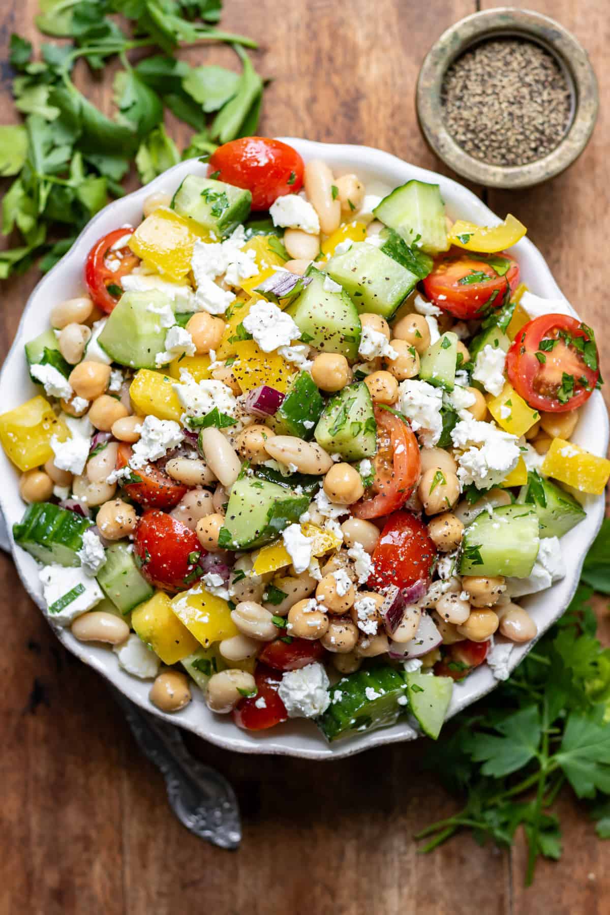 Looking down at a bowl of Mediterranean Bean Salad.