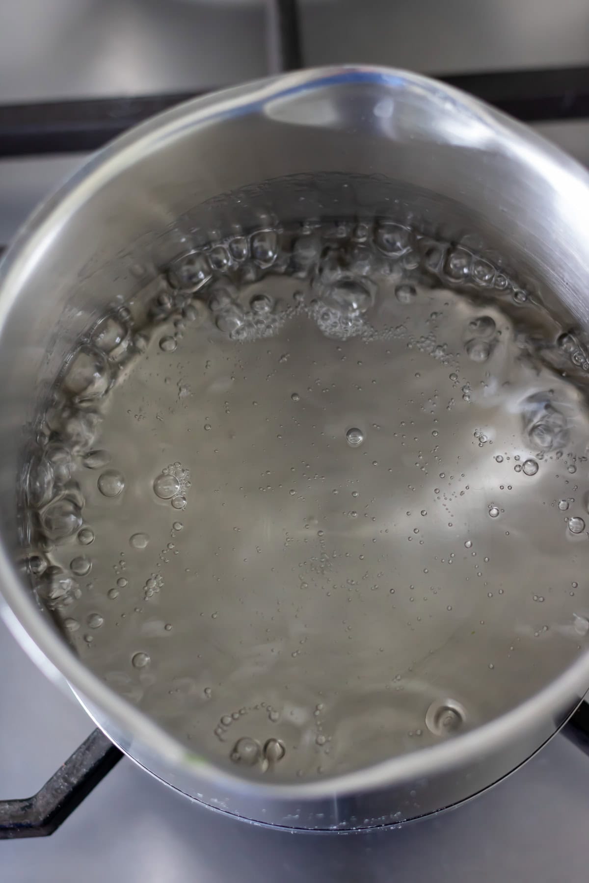 Simmering the sugar water.