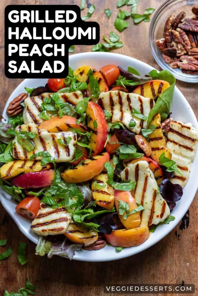 Bowl of salad, with text Grilled Halloumi Peach Salad.