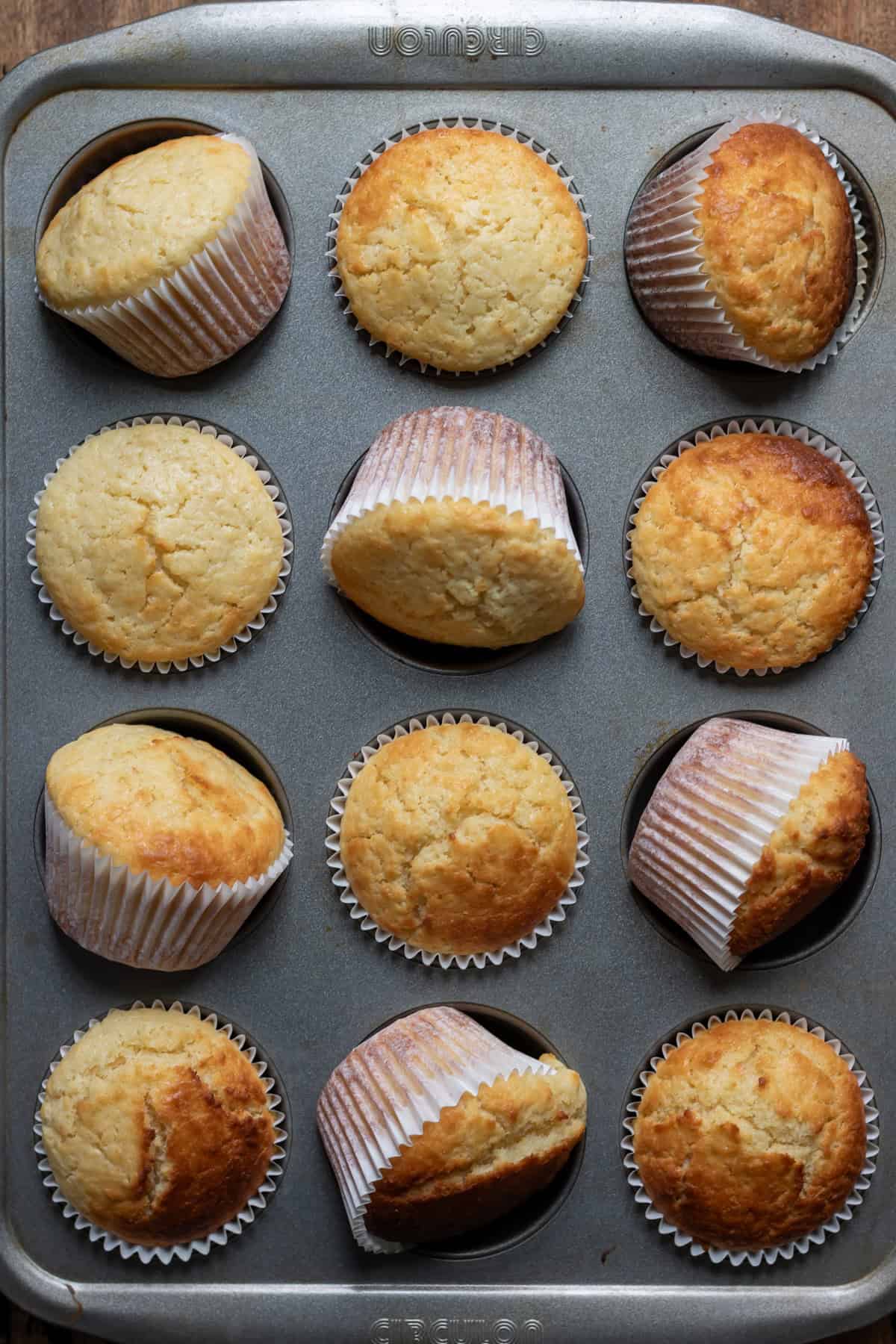 Baked lime coconut muffins in the pan.