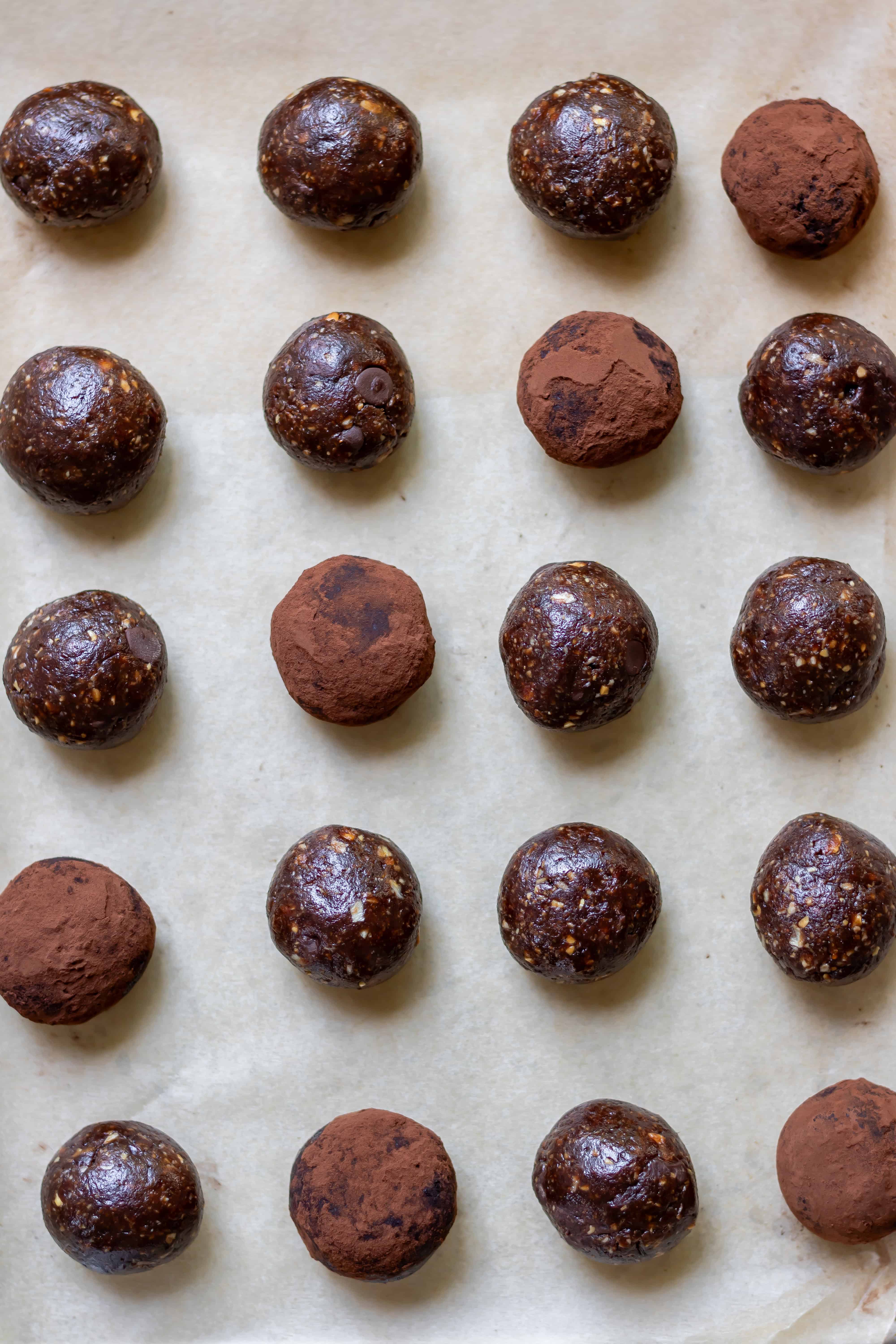 Rows of chocolate brownie energy balls.