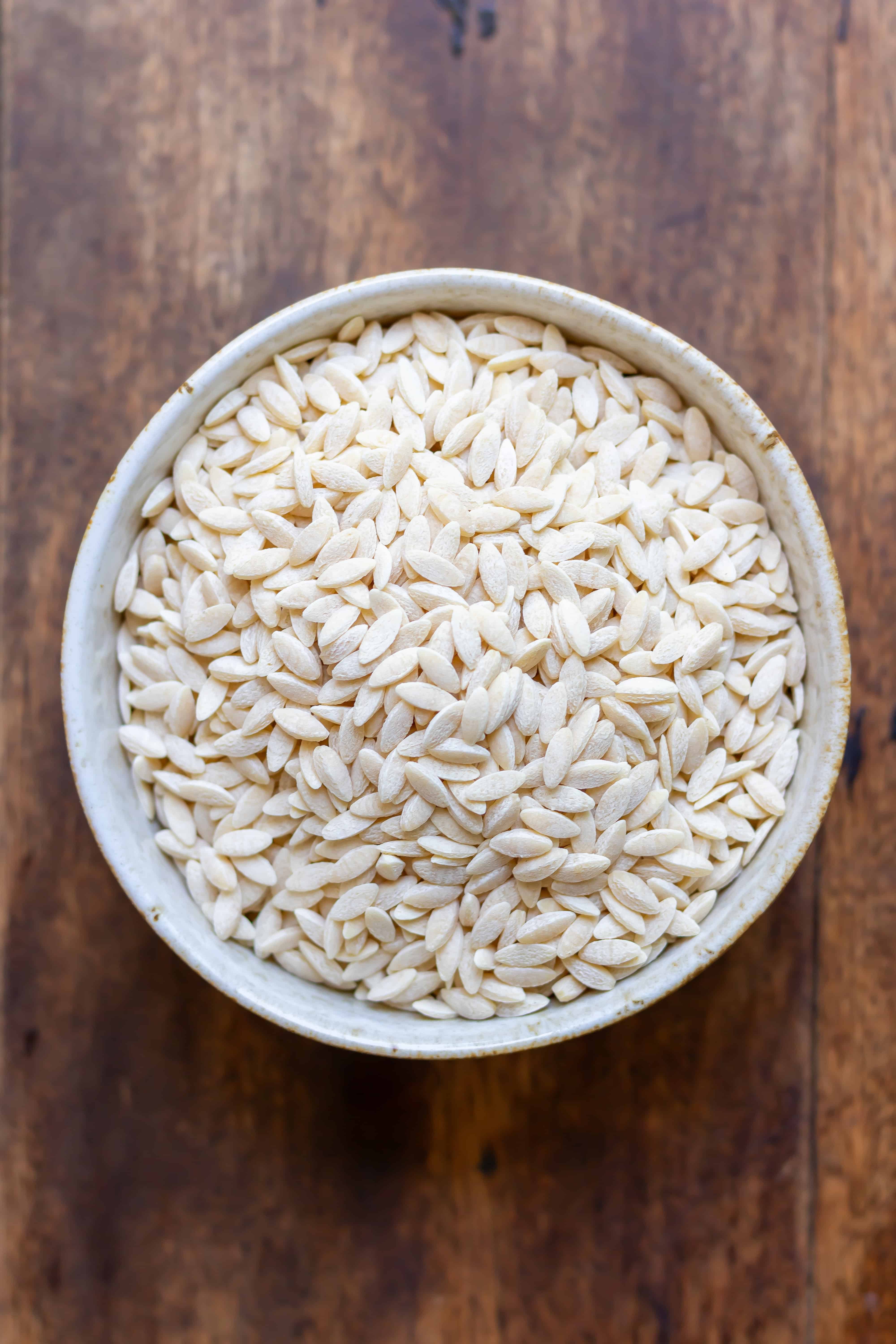 Bowl of uncooked orzo.