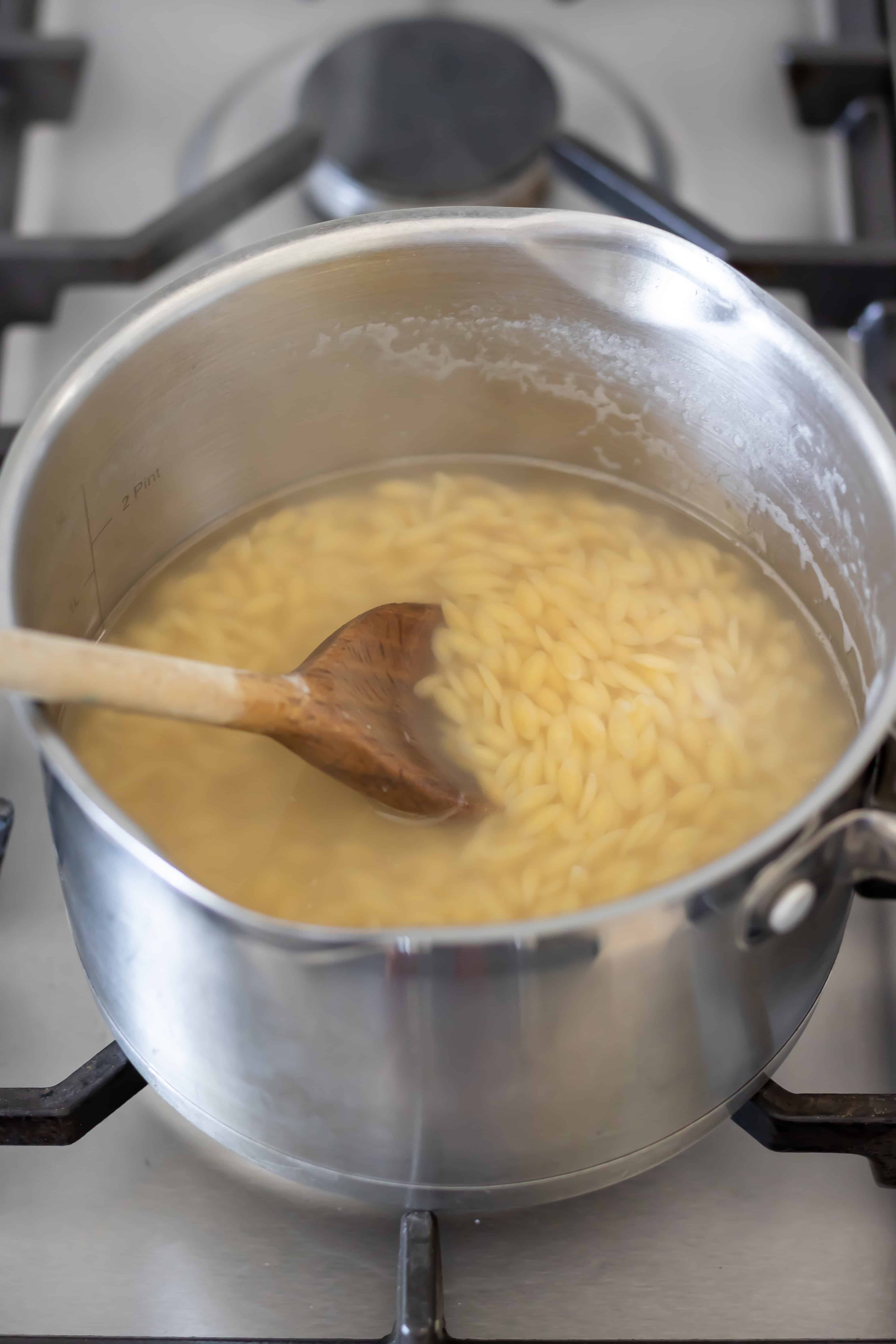 Cooking the orzo.
