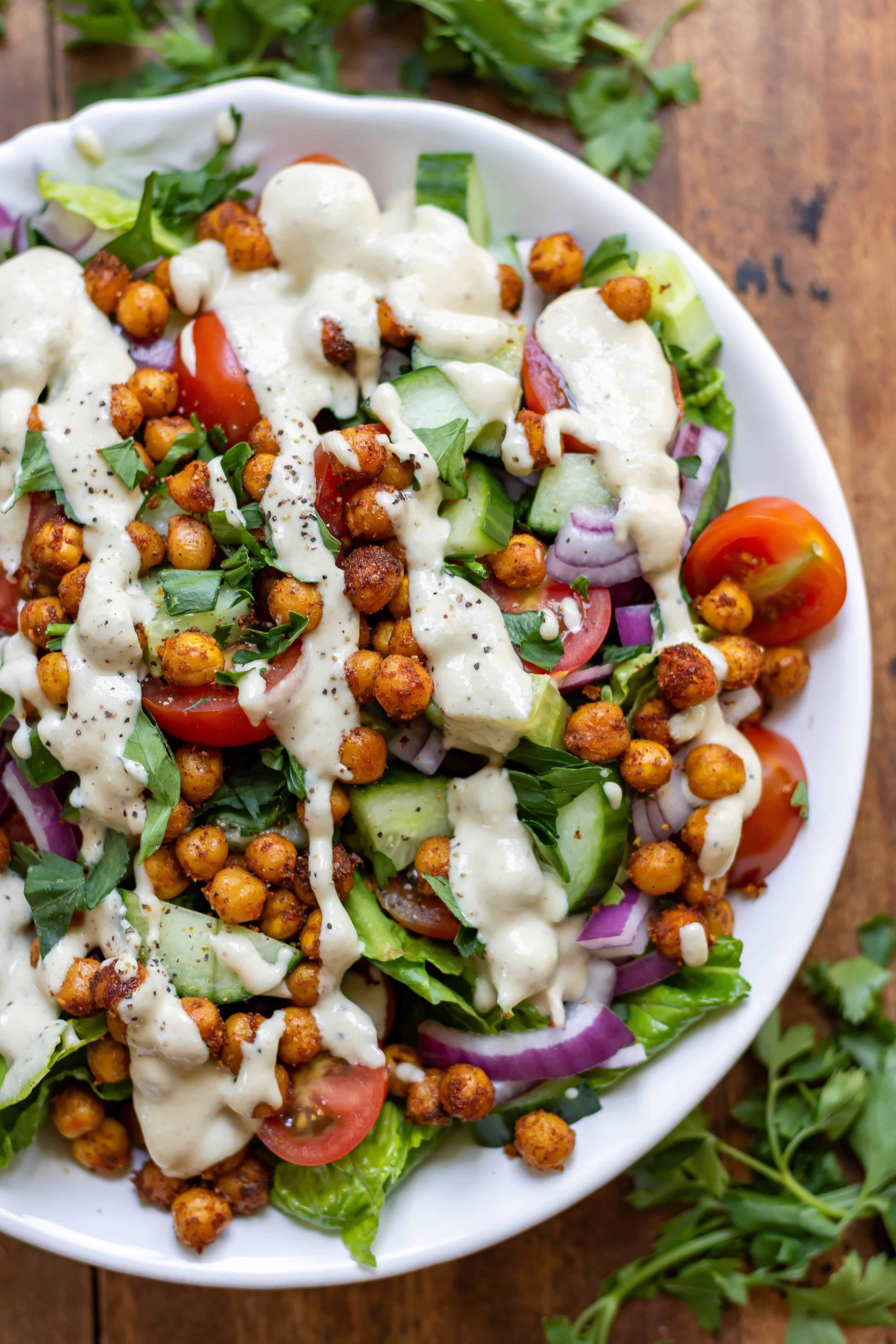 Close up of a serving dish of shawarma chickpea salad.