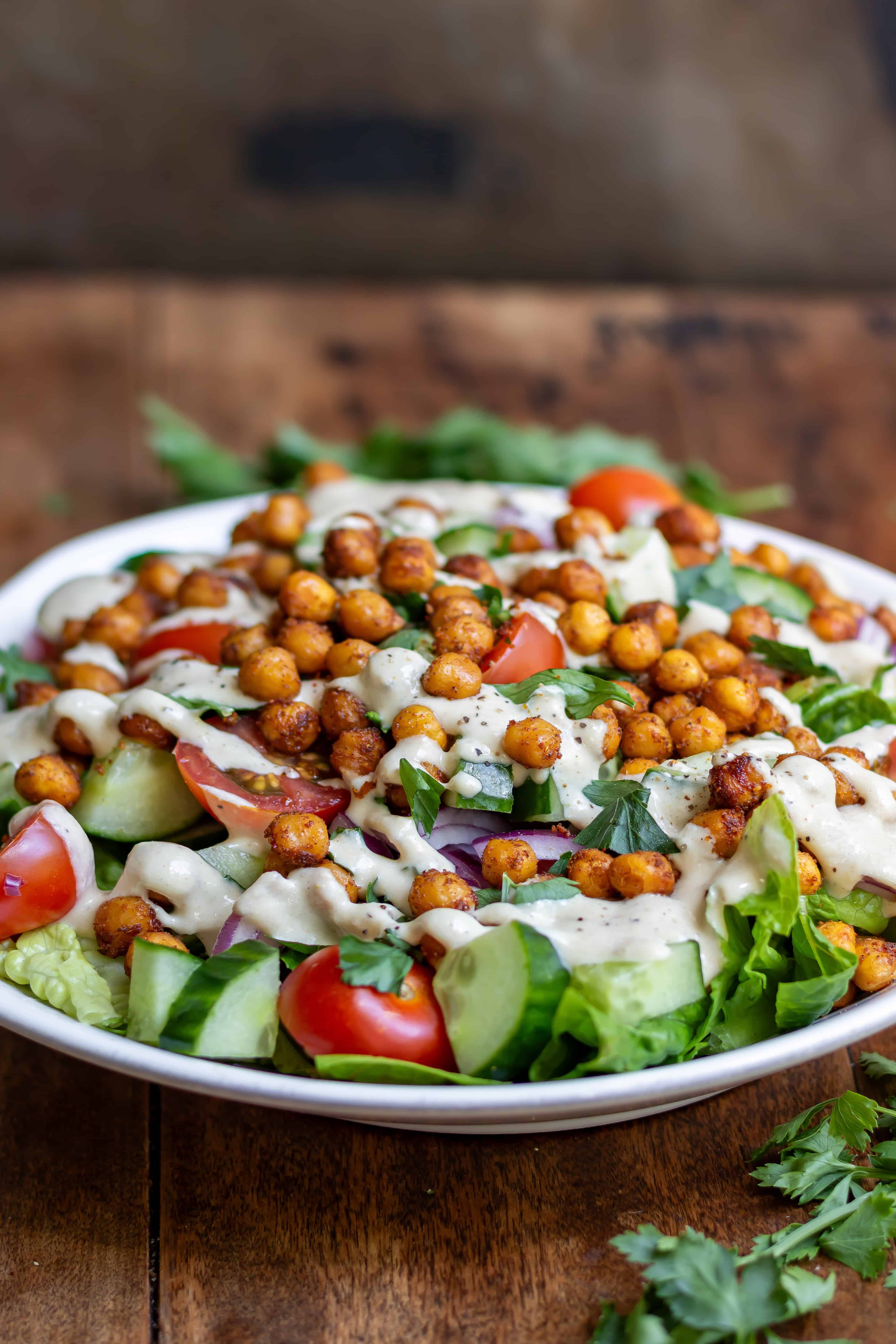 Side view of a serving dish of chickpea shawarma salad.