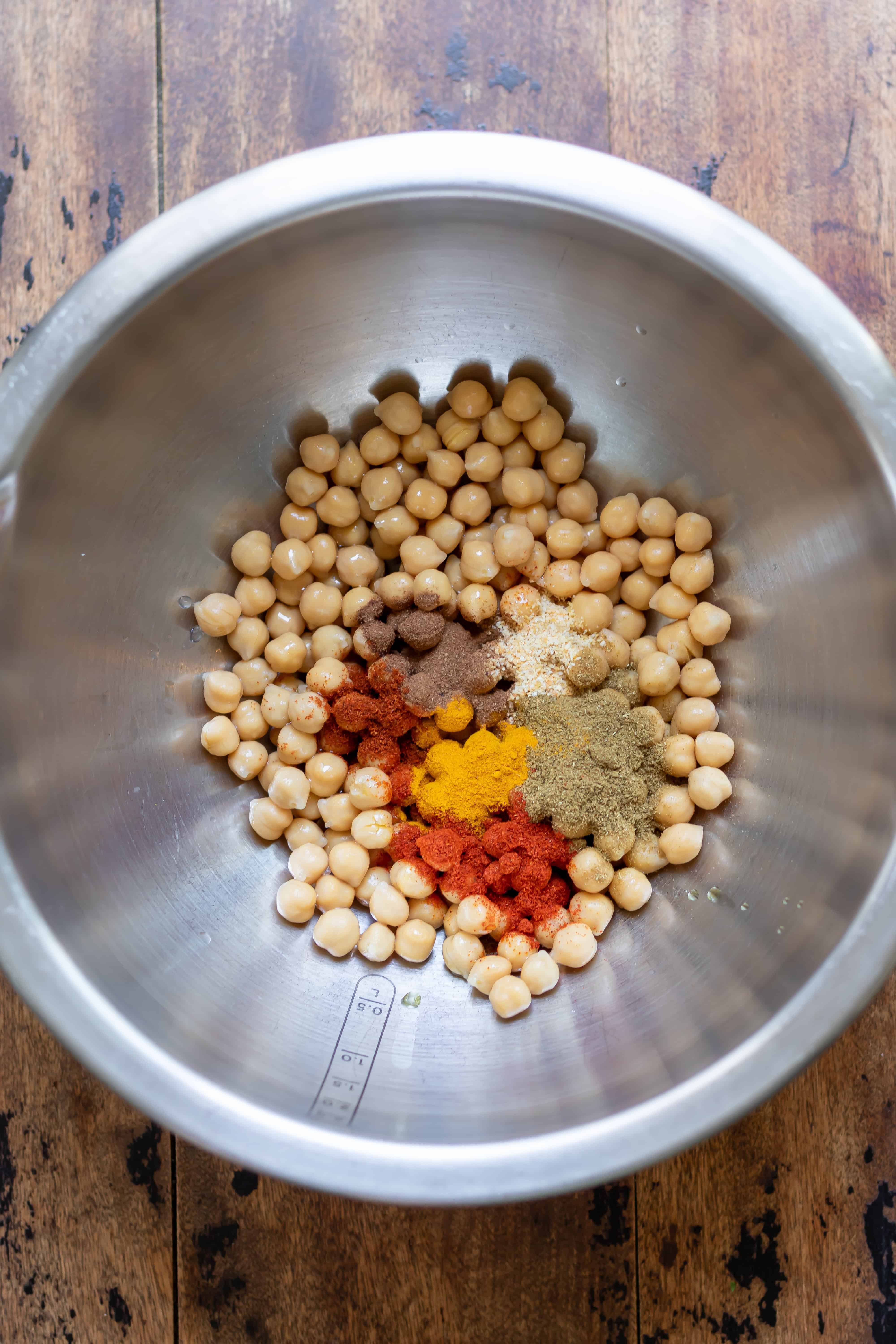 Bowl of chickpeas with shawarma inspired spices.