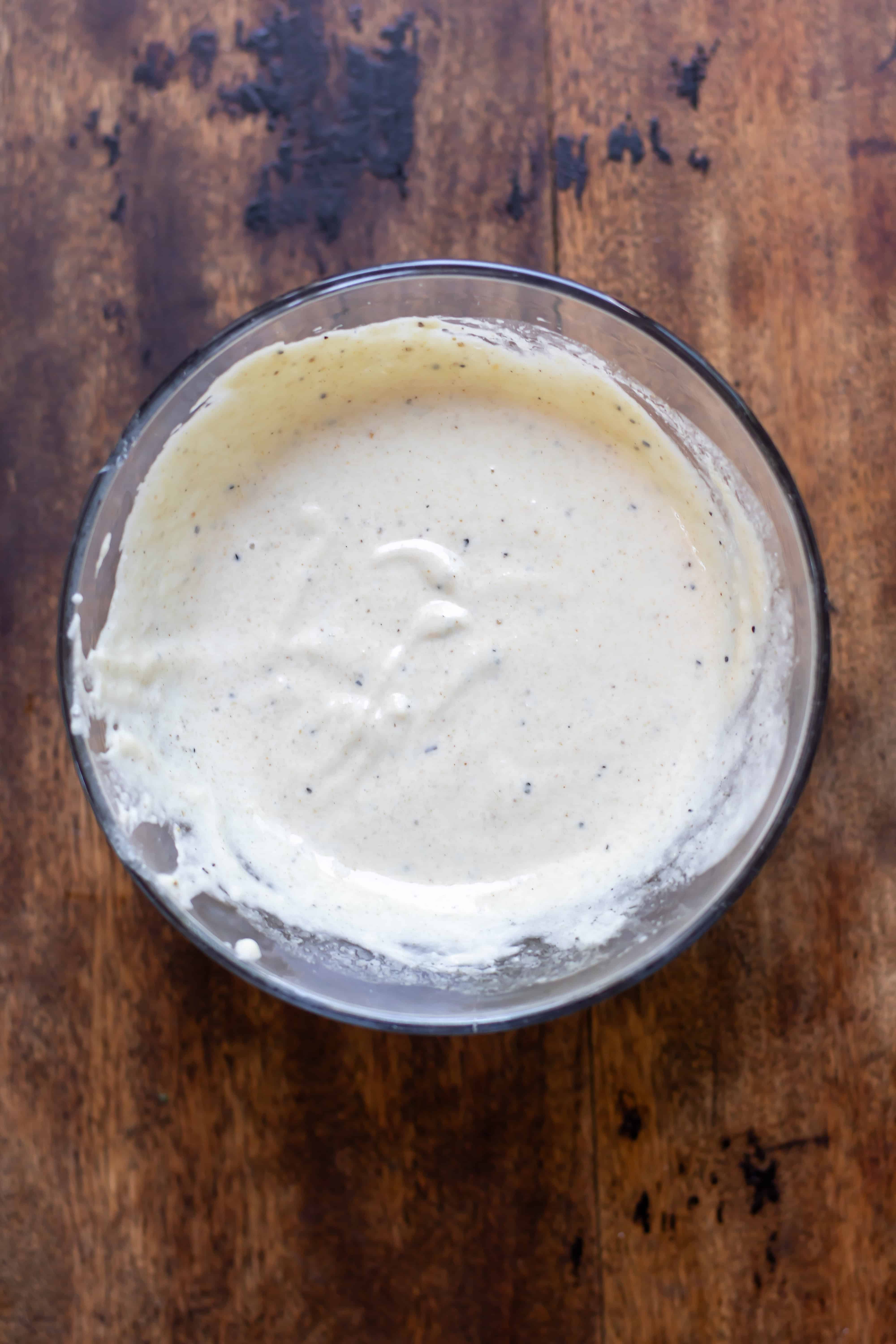 Tahini dressing in a bowl.