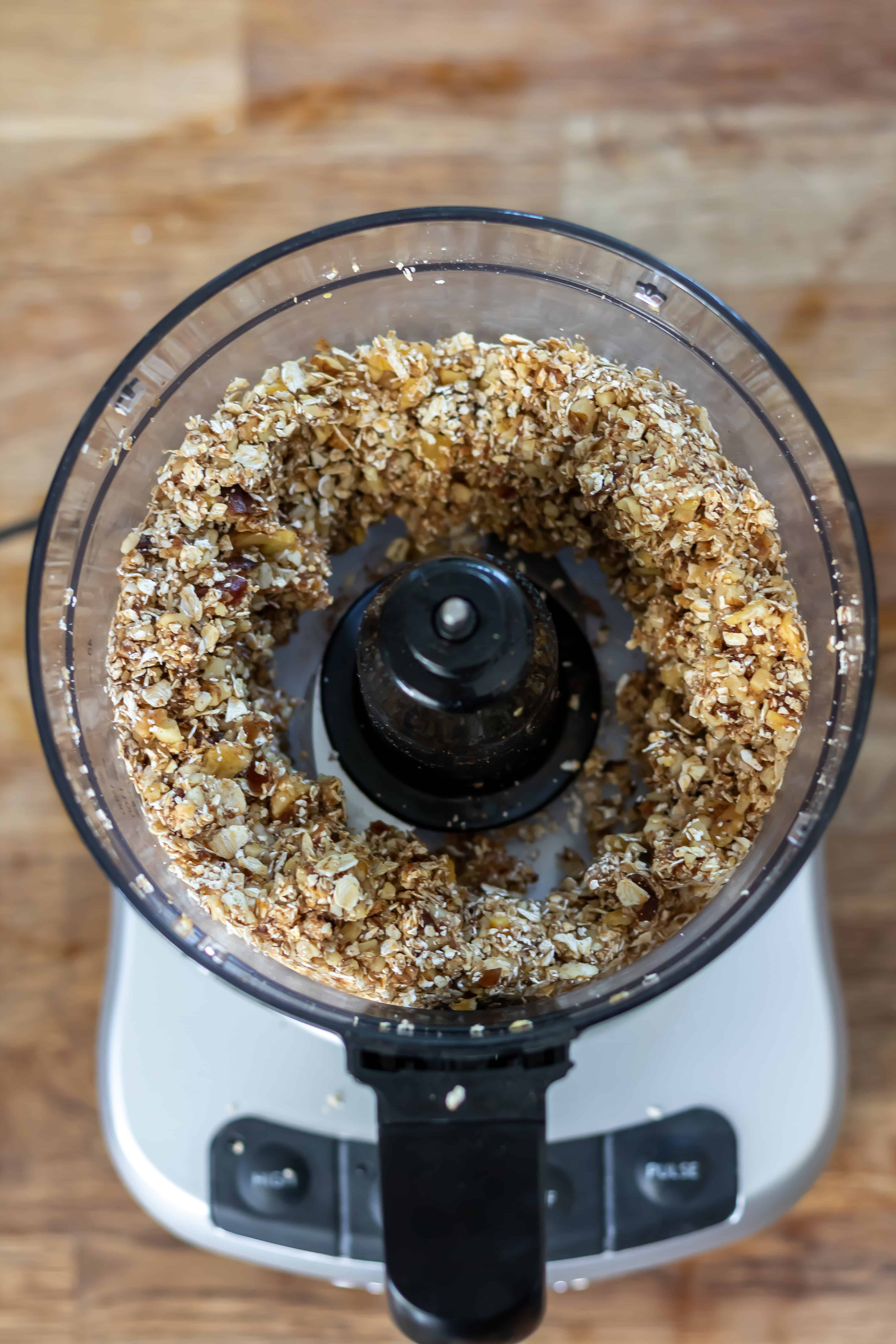Partially mixed banana bread energy ball batter.