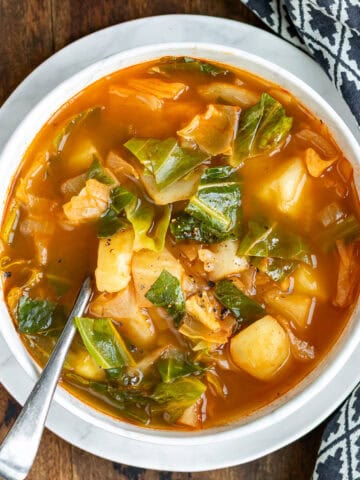 Close up of a bowl of healthy cabbage soup.