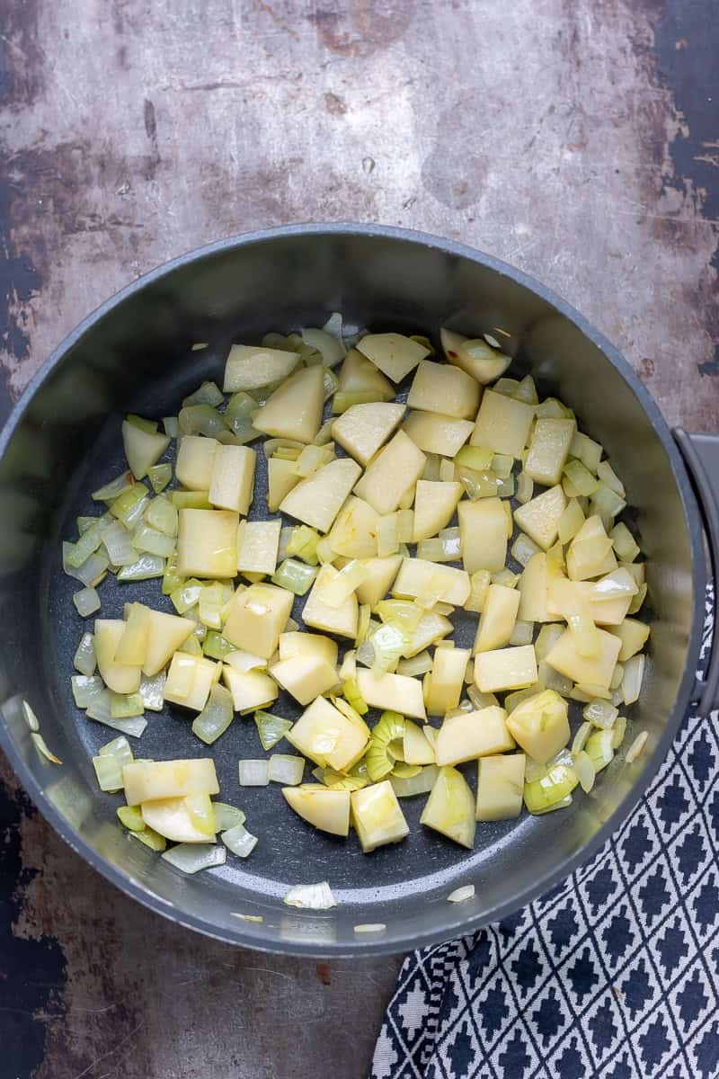 Potatoes added to the pot.
