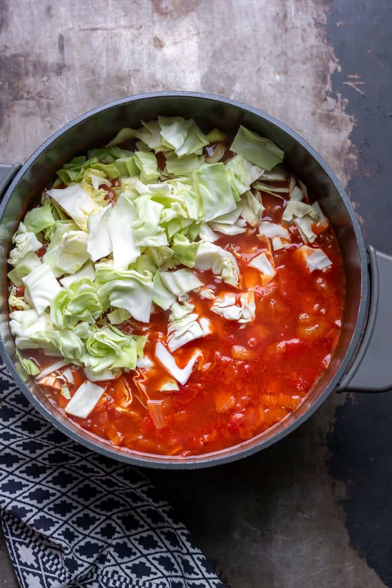 Cabbage added to the pot.