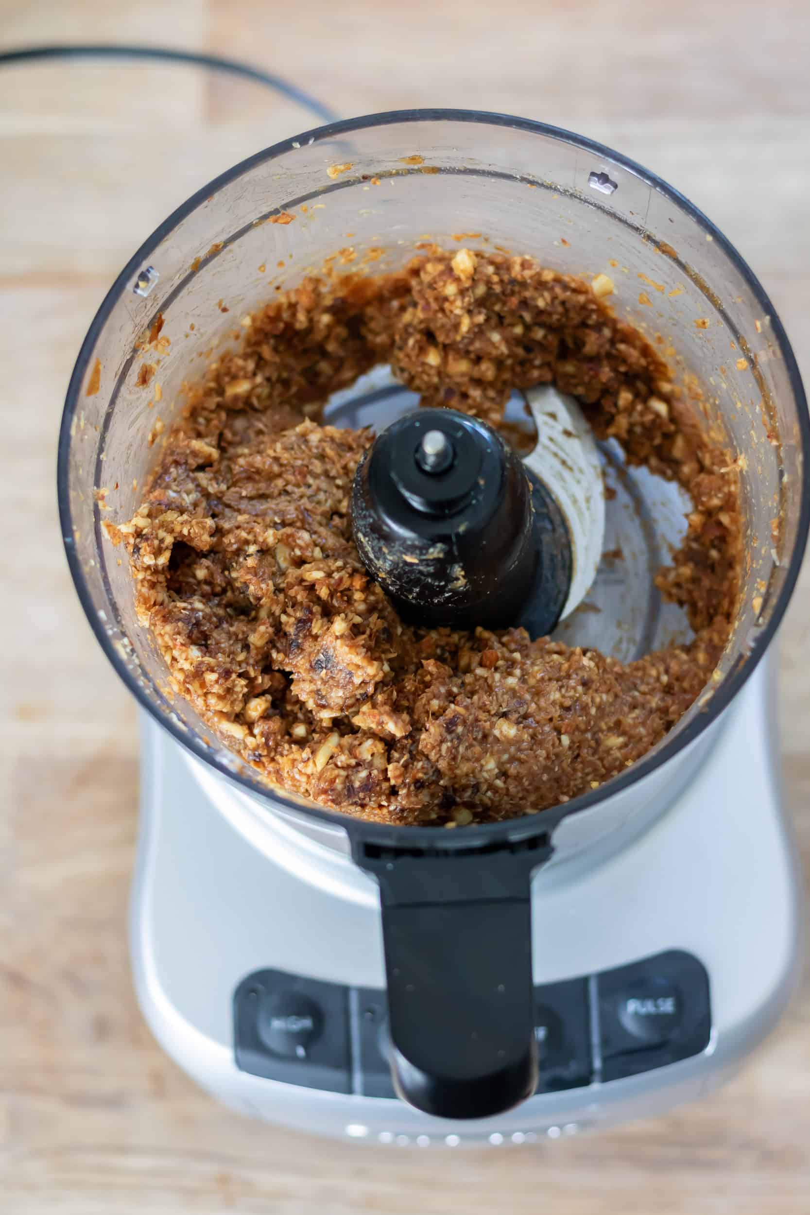Processed energy ball mixture in the food processor.