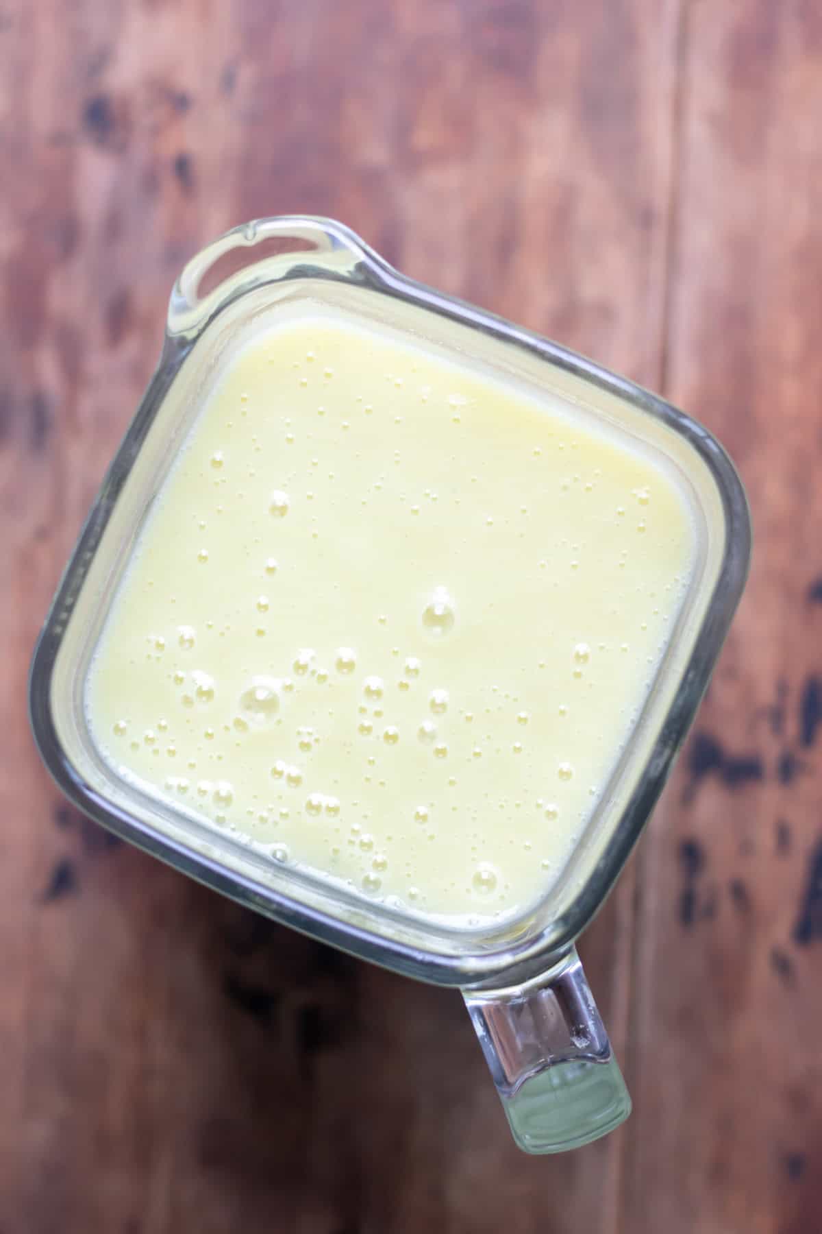 Blended leek and potato soup in a blender.