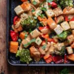 Corner of the sheet pan of Peanut Lime Tofu Vegetable Bake