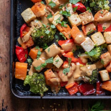 Corner of the sheet pan of Peanut Lime Tofu Vegetable Bake