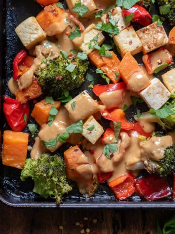 Corner of the sheet pan of Peanut Lime Tofu Vegetable Bake